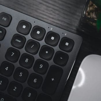 Close up of the number keys on a black keyboard